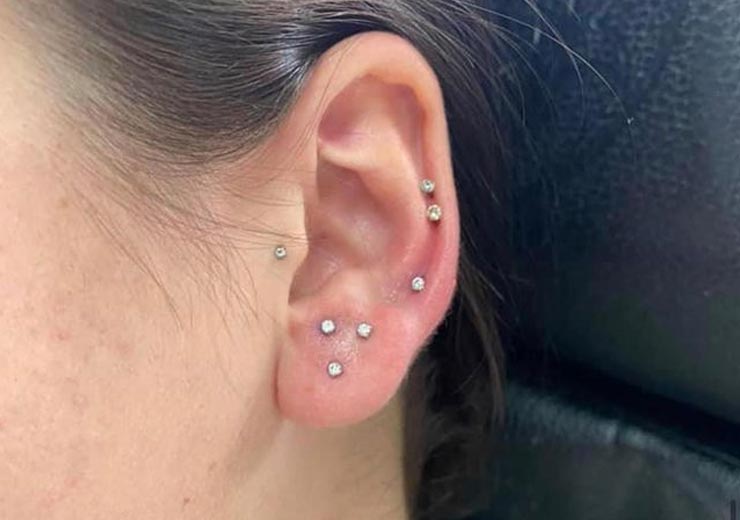 Woman with multiple piercings